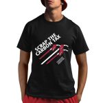 Kris Sims Wearing Scrap The Carbon Tax Shirt