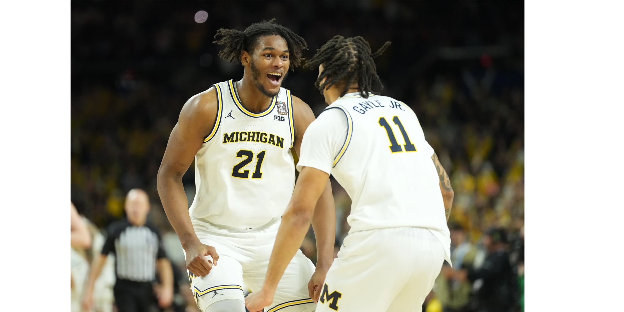 Morez Johnson Jr. and Roddy Gayle Jr. celebrate Michigan's 2026 NCAA national title victory over UConn