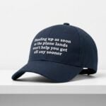 Standing Up As Soon As The Plan Lands Won't Help You Get Off Any Sooner Hat